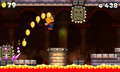 Early World 1-Castle. The pillar that Mario is over does not sink into the lava in the final. Also, the Thwomp's purple effect can be seen.