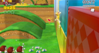 An early screenshot of Really Rolling Hills; the Arrow Sign in the background is integrated into the wall in the final game